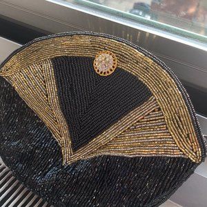 Talk of the City Black and Gold Clutch